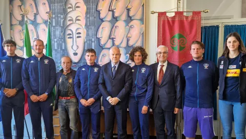 Rettore e atleti mondiali 